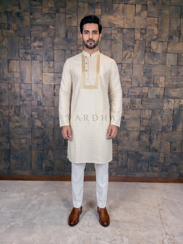 Off-White Designer Embroidered Kurta. Masterfully balancing heavy traditional embellishments with modern geometric patterns,