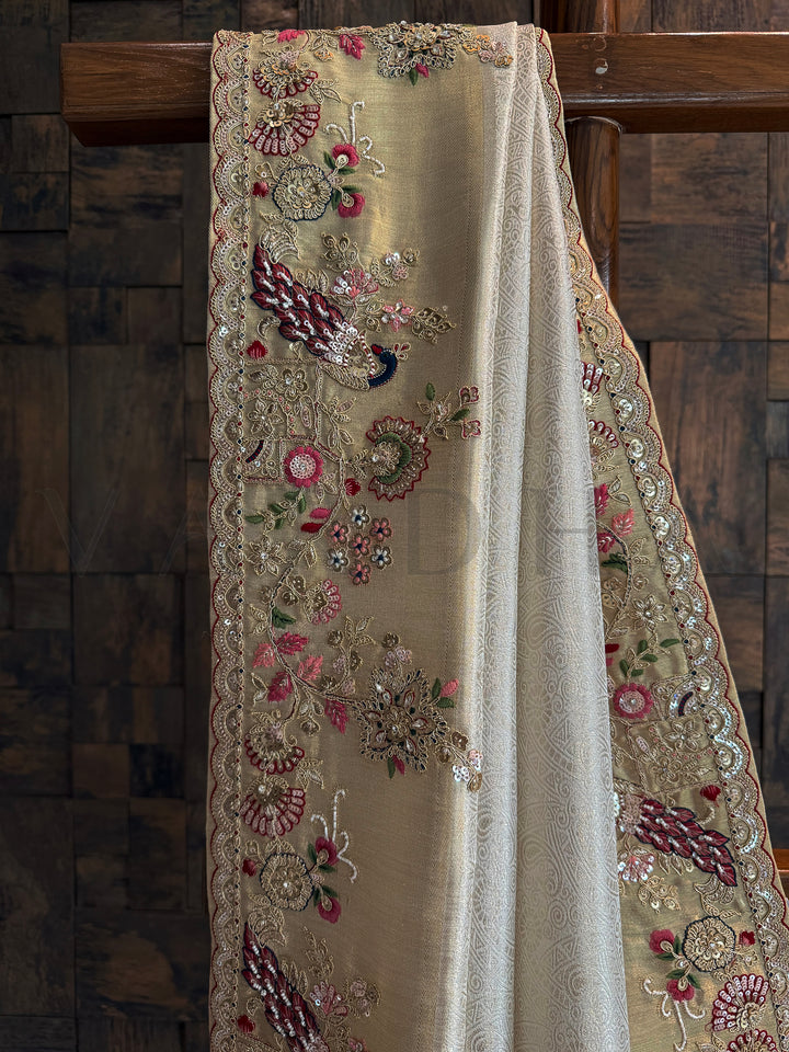 Detailed view of scalloped border with zari embroidery and sequins on Off White Kanjivaram Tissue Saree.