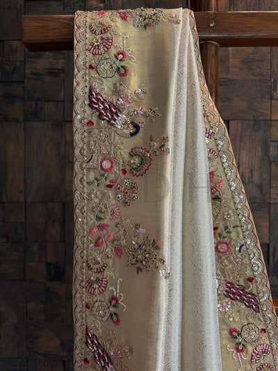 Detailed view of scalloped border with zari embroidery and sequins on Off White Kanjivaram Tissue Saree.