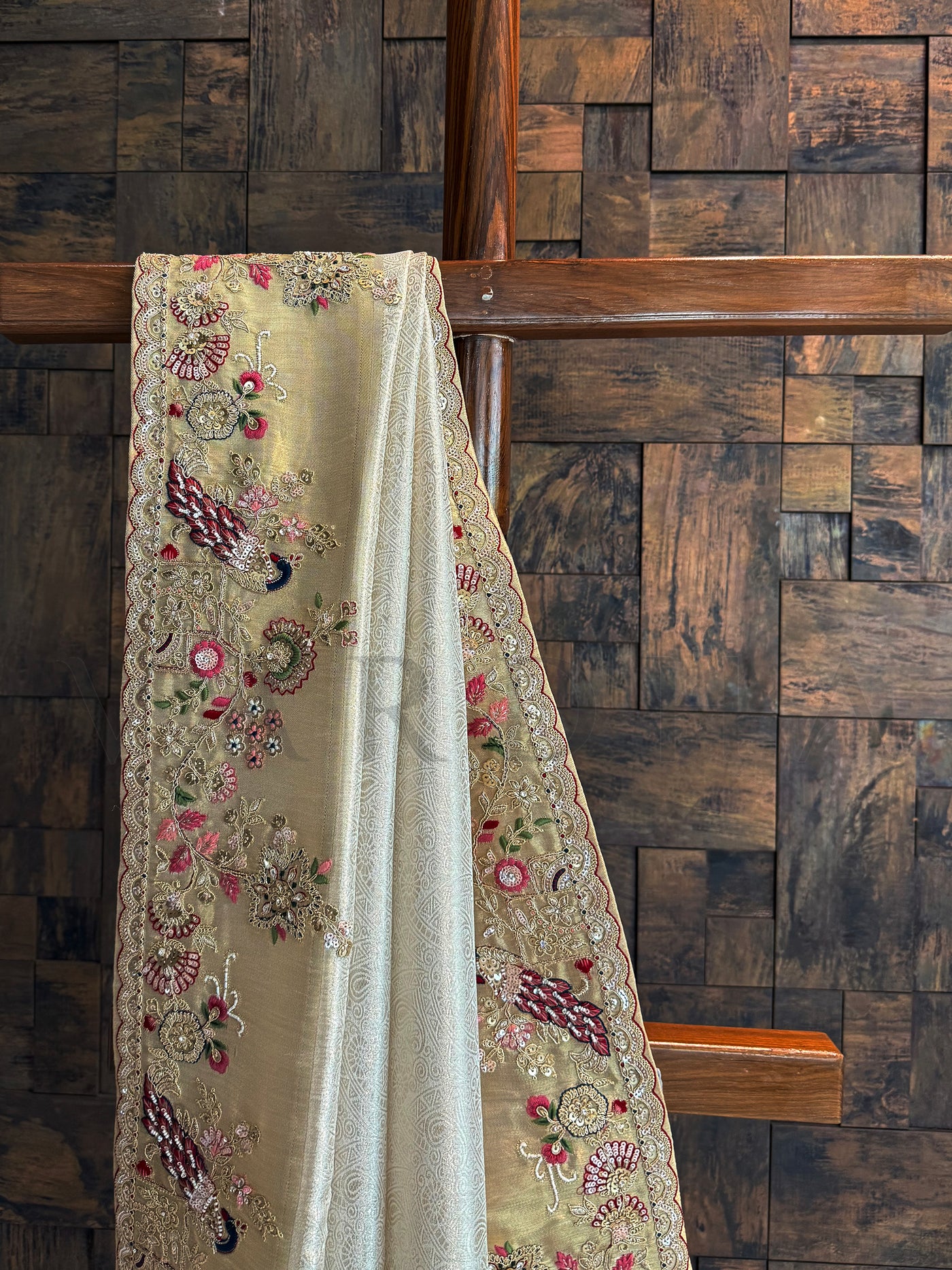 Traditional Kanjivaram Tissue Saree showcasing luxurious shimmer and heritage embroidery design.