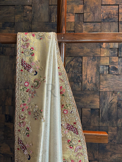 Traditional Kanjivaram Tissue Saree showcasing luxurious shimmer and heritage embroidery design.