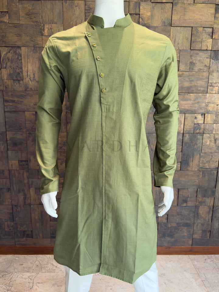 Green kurta on a mannequin against a wooden paneled wall. Close-up of the olive green kurta showcasing the modern diagonal placket and crisp mandarin collar.