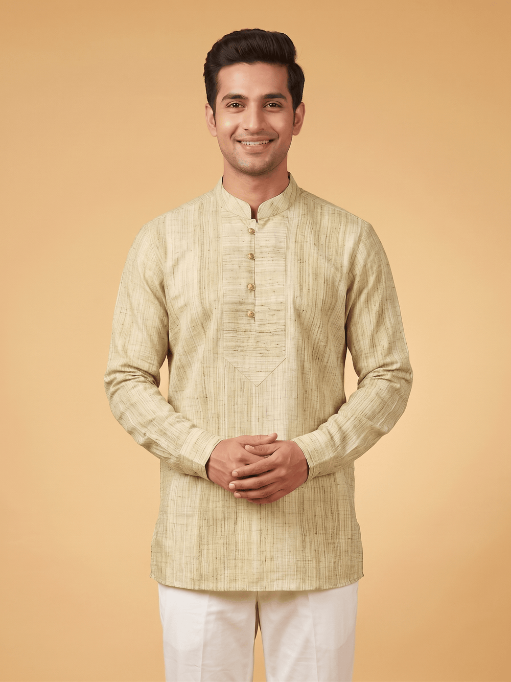 A man wearing a light beige textured kurta with a mandarin collar and white trousers, standing against a solid warm beige background. Back view of a man showcasing the fit of an olive green textured cotton short kurta paired with white trousers.