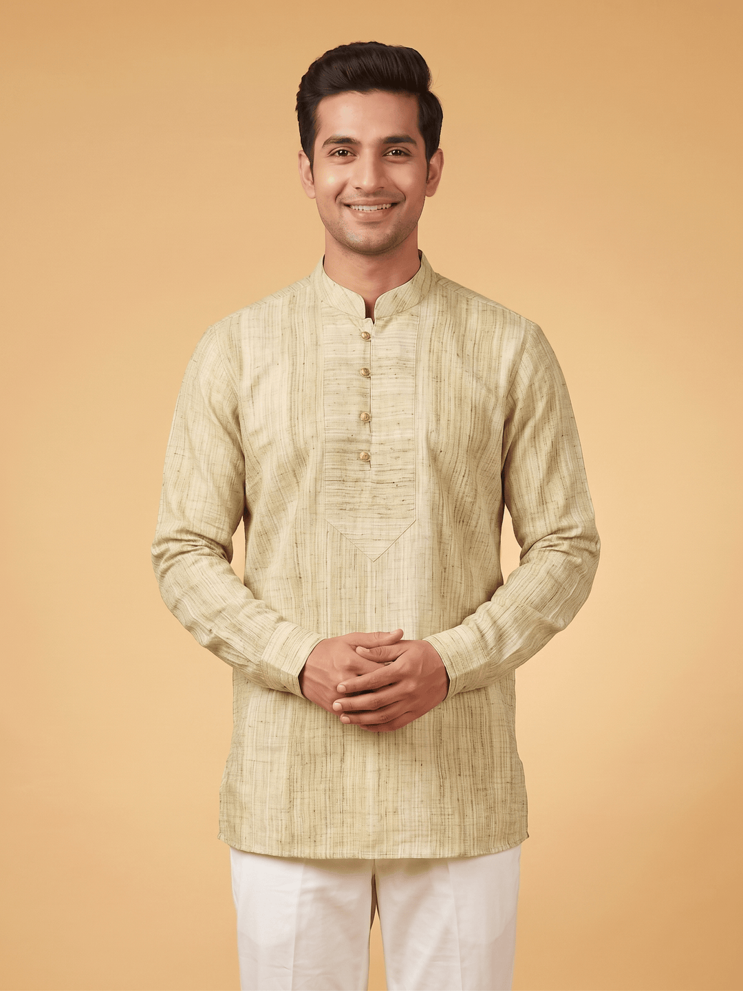 A man wearing a light beige textured kurta with a mandarin collar and white trousers, standing against a solid warm beige background. Back view of a man showcasing the fit of an olive green textured cotton short kurta paired with white trousers.