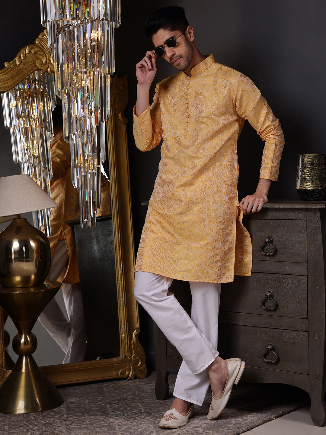 Sophisticated traditional kurta for men in a warm peach-orange hue, ideal for festive formal wear

