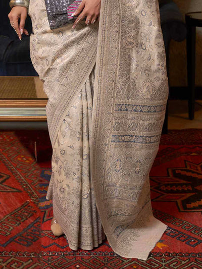 Luxurious Pastel Brown Floral Woven Saree made from Kashmiri Modal Silk, highlighting Artisanal Handloom Weaving and Timeless Elegance for Special Events.

