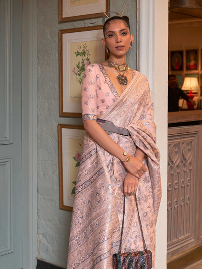 Elegant Peach Floral Woven Saree in Kashmiri Modal Silk, showcasing Traditional Handloom Techniques and Exquisite Floral Patterns, perfect for Cultural Celebrations.

