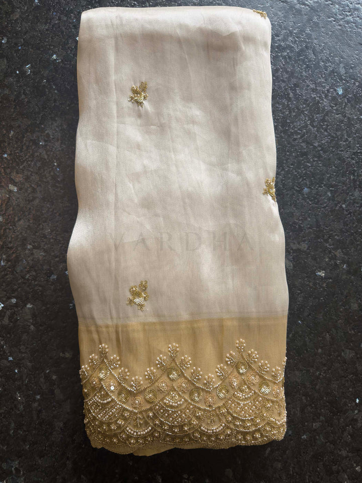 White Tissue Silk Saree with Heavy Hand Zardozi & Pearl Work