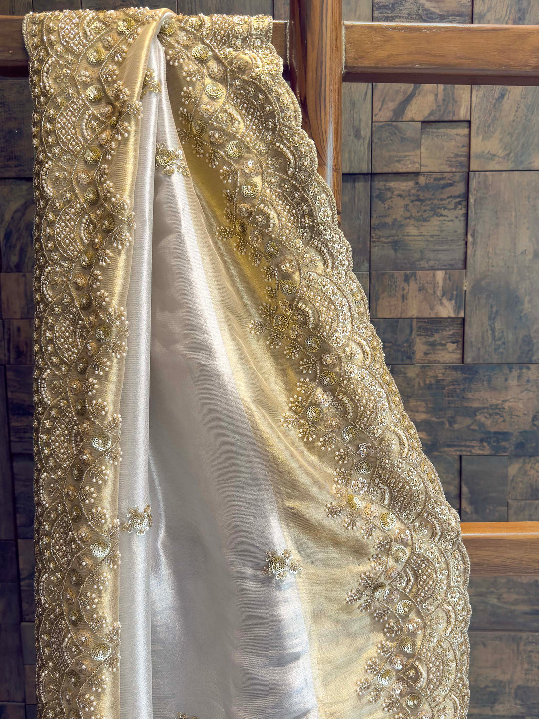 White Tissue Silk Saree with Heavy Hand Zardozi & Pearl Work