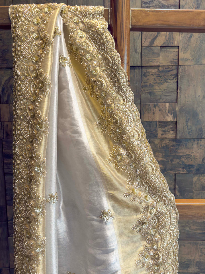 White Tissue Silk Saree with Heavy Hand Zardozi & Pearl Work
