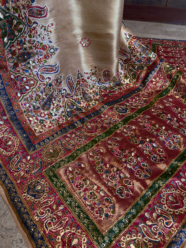 Cream Banarasi Katan Silk Saree with Cutdana & Zircon Hand Work