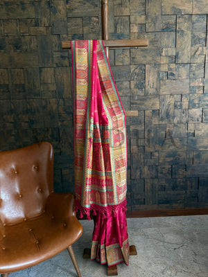 Full Draped View of Banarasi Silk Saree with Ornate Tassels and Mughal Jaal

