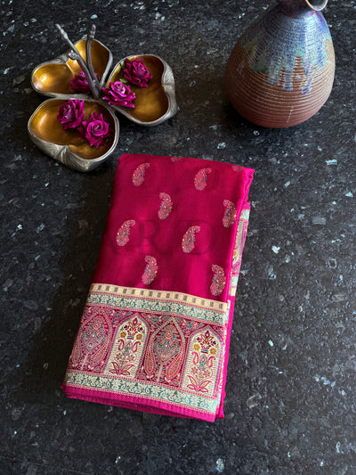 Folded Saree Display with Brocade Buta and Antique Gold Weaving Details
