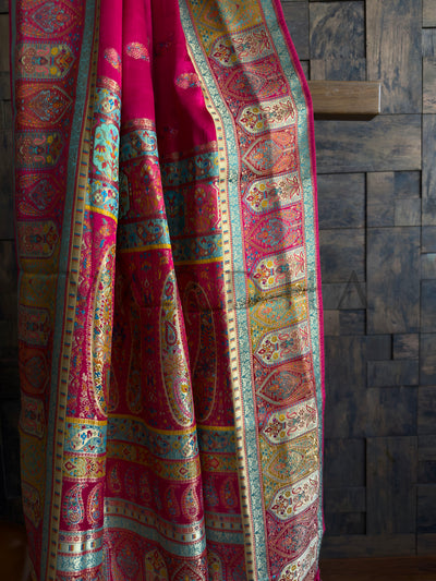 Close-Up of Traditional Paisley Woven Pallu in Pink, Teal, and Mustard Accents

