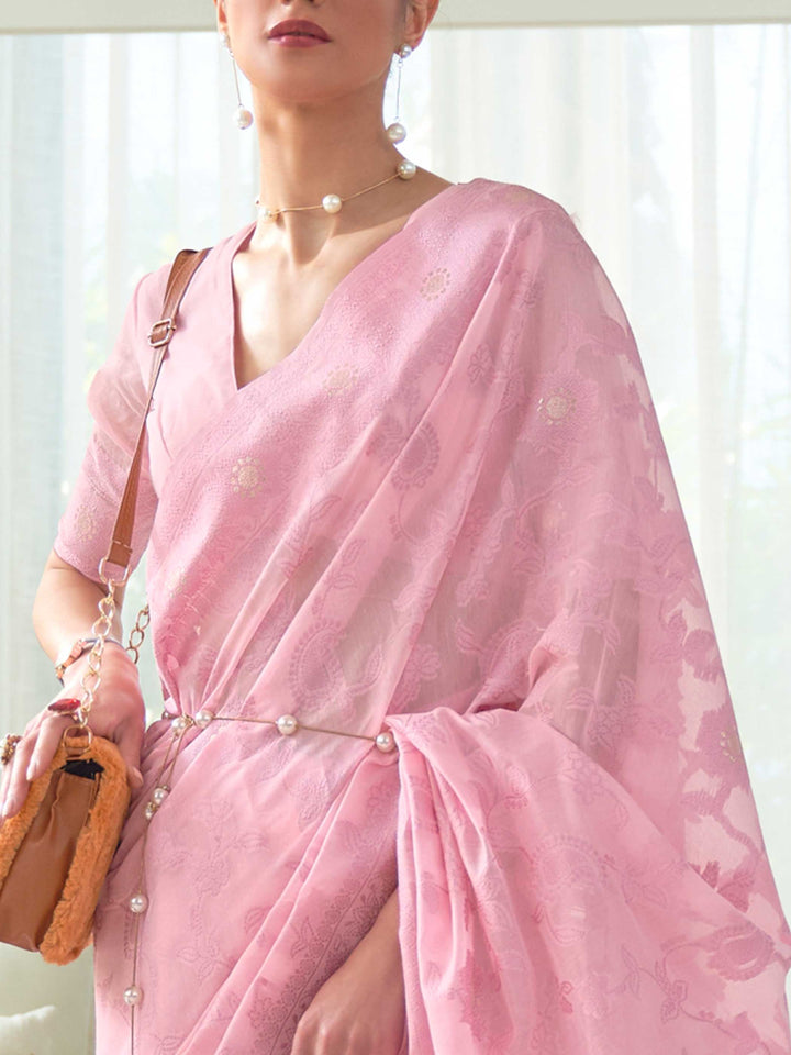 Elegant Pink Chikankari Georgette Saree adorned with Intricate Lucknowi Weaving, perfect for Bridal Wear and Cultural Celebrations.

