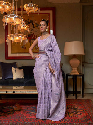 Purple Kashmiri Modal Silk Saree featuring Intricate Floral Weaving and Handloom Craftsmanship, offering a Luxurious Drape for Elegant Occasions.

