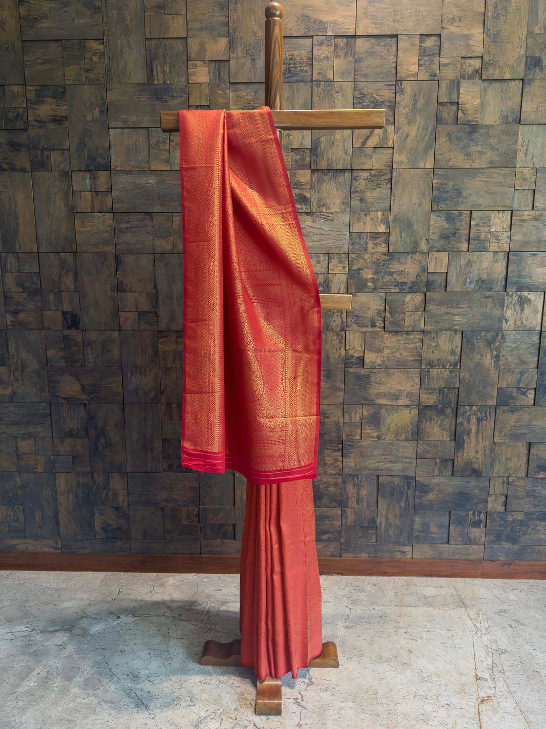 Red Golden Zari Kanjivaram Silk Saree House of Vardha. Beautifully draped classic red Kanjivaram saree highlighting fine gold woven vines and a rich traditional heavy zari pallu by House of Vardha.