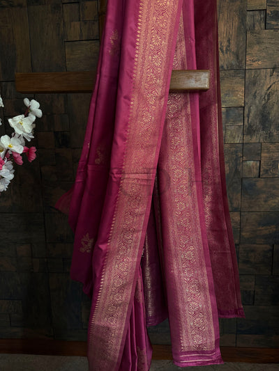 Soft rose satin saree with gold weave border – perfect for pooja and family gatherings.

Light pink satin silk saree for women with vintage-style zari detailing and elegant drape.

Ethnic festive saree in rose pink satin with refined gold border and smooth fall.

Rose satin saree with intricate border and light floral accents – trending elegant ethnic look.