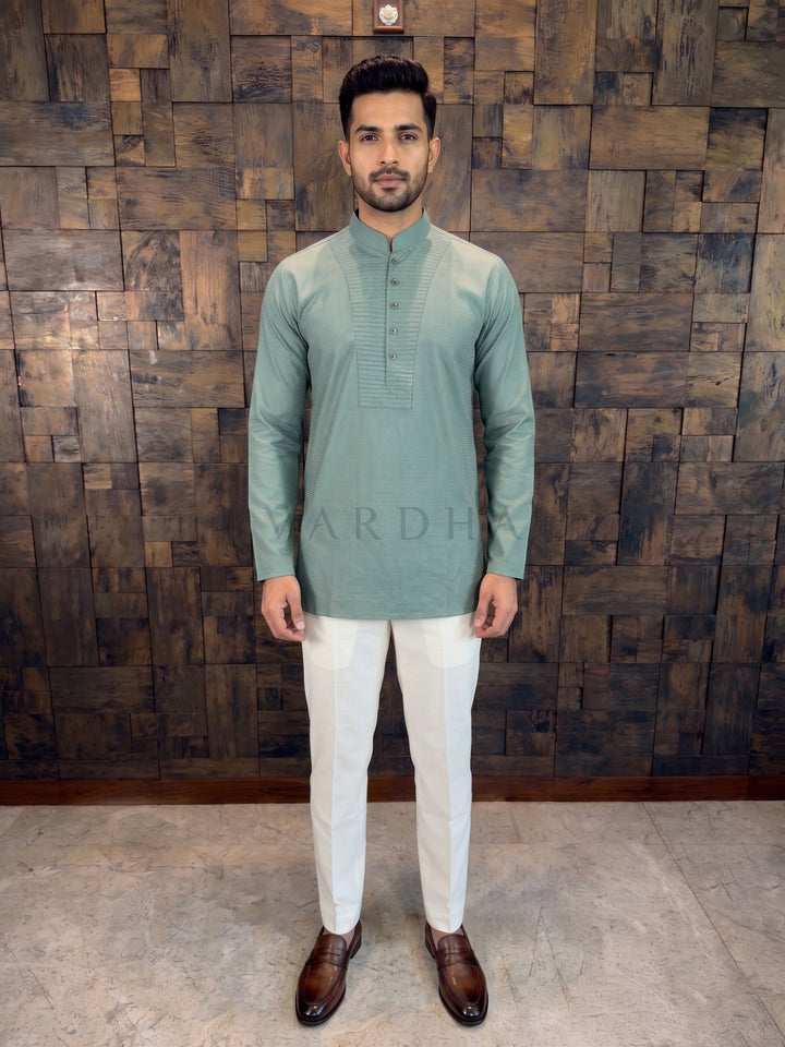 Man wearing Sage Green Cotton Short Kurta with Pintuck Yoke Work