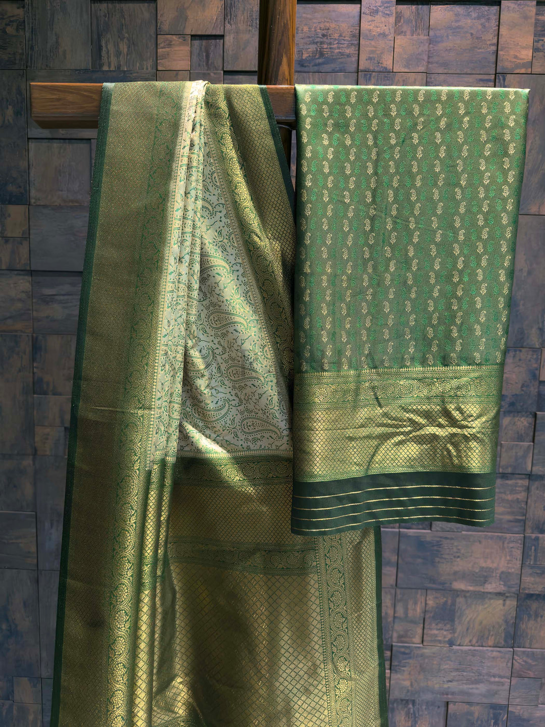 Saree with matching Forest Green blouse piece featuring all-over zari paisley buttis.