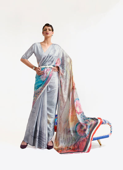 Silver grey and blue digital printed soft crepe saree with Bollywood drape and floral patterns, ideal for festive occasions.