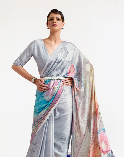 Elegant silver grey and blue soft crepe saree adorned with digital floral patterns and Bollywood drape, suitable for special events.