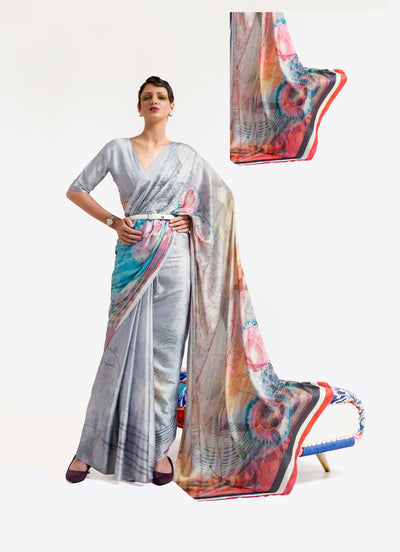 Chic silver grey and blue digital printed crepe saree with Bollywood-inspired drape and floral designs for festive occasions.