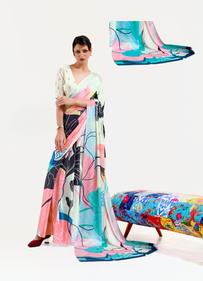 Fashionable black and pastel green-white crepe saree featuring digital floral prints and elegant Bollywood drape, suitable for cultural events.