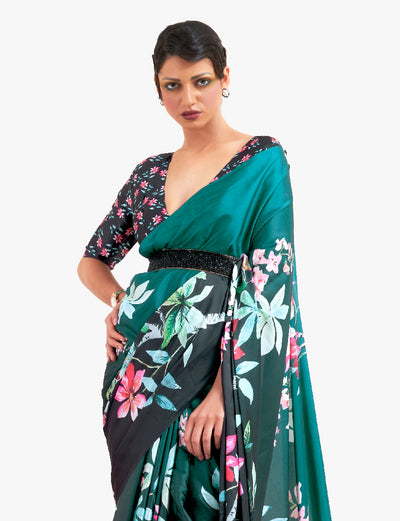 Elegant teal green and black soft crepe saree adorned with digital floral designs and Bollywood drape, suitable for special events.