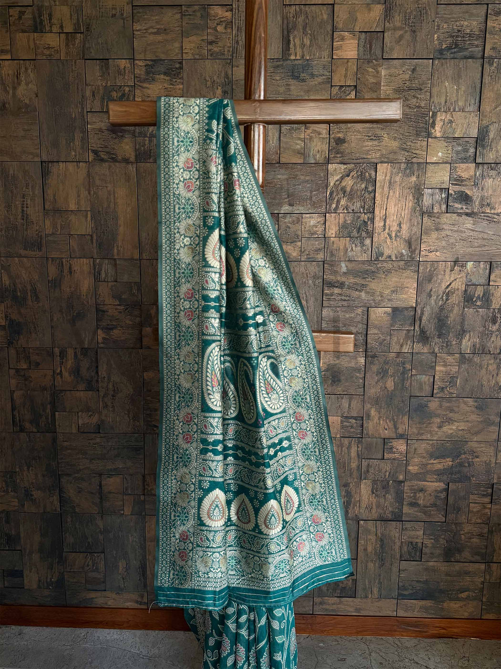 Elegant Teal Green Georgette Saree adorned with Exquisite Chikankari Embroidery and a Matching Blouse, perfect for Traditional Gatherings and Special Events.

