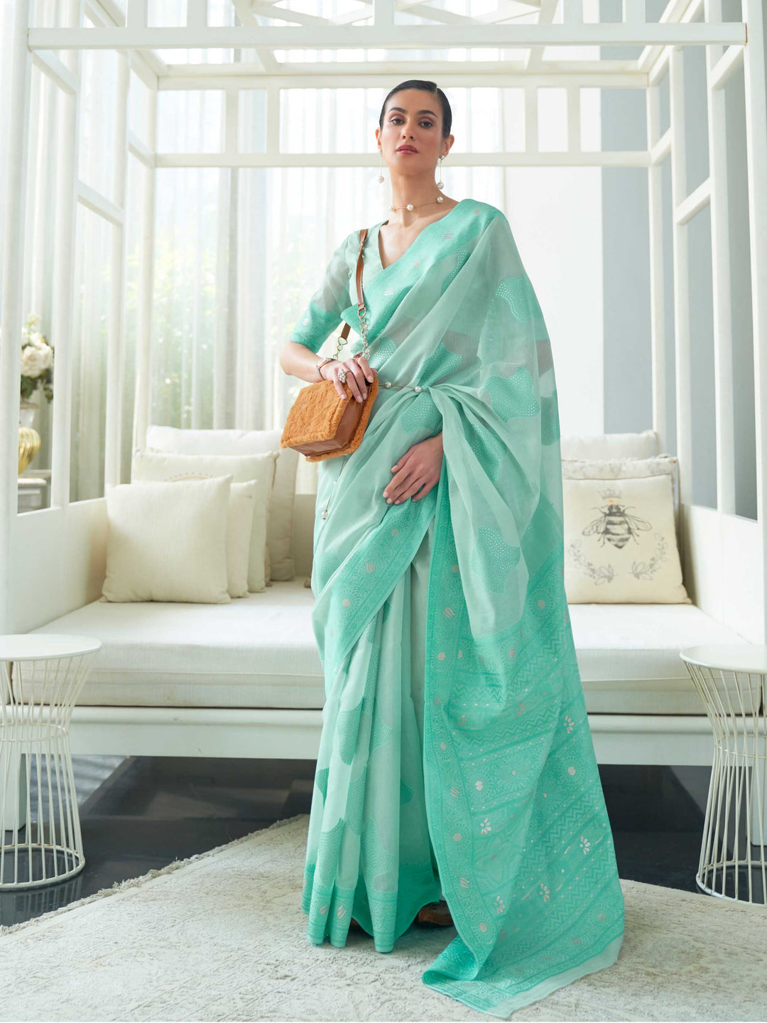 Turquoise Lucknowi Chikankari Cotton Saree featuring Traditional Handwoven Embroidery, ideal for Wedding Ceremonies and Festive Occasions. 
