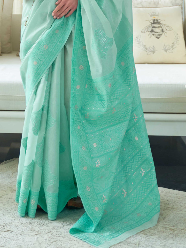 Handcrafted Turquoise Chikankari Organza Saree with Exquisite Traditional Patterns, suitable for Wedding Receptions and Grand Events.

