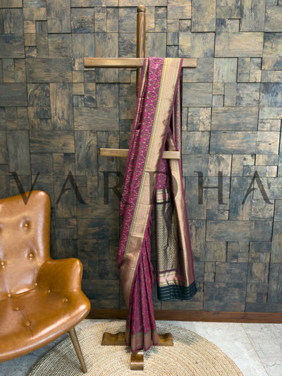 Wine Tanchoi silk saree with intricate thread weaving and satin brocade design House of Vardha Tanchoi silk saree in wine color with festive gold accents

