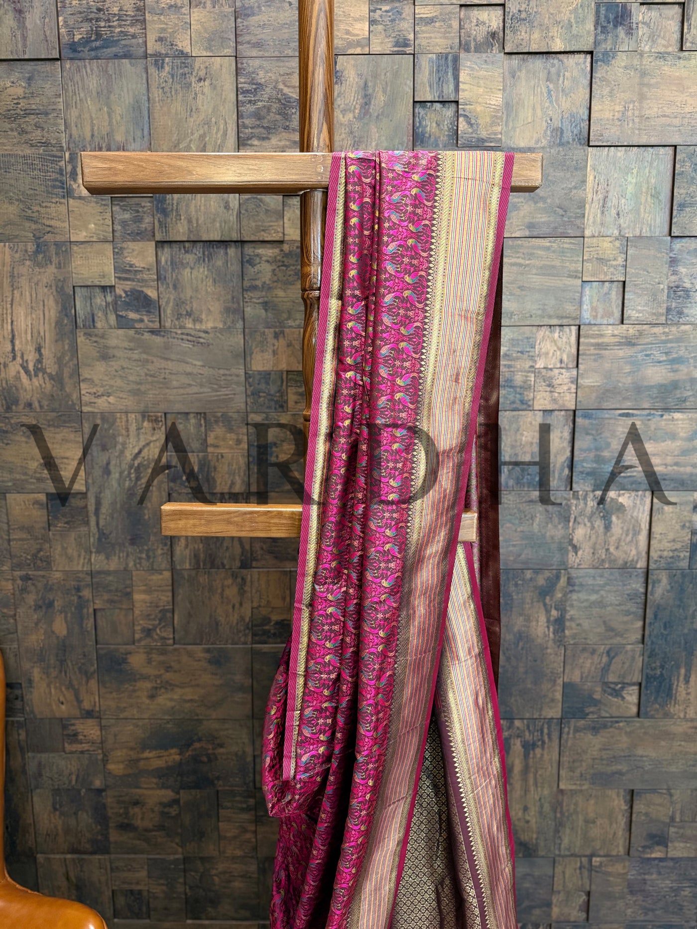 Handwoven wine silk saree with gold border and soft satin texture
Tanchoi weave wine saree with brocade pattern perfect for festive wear
