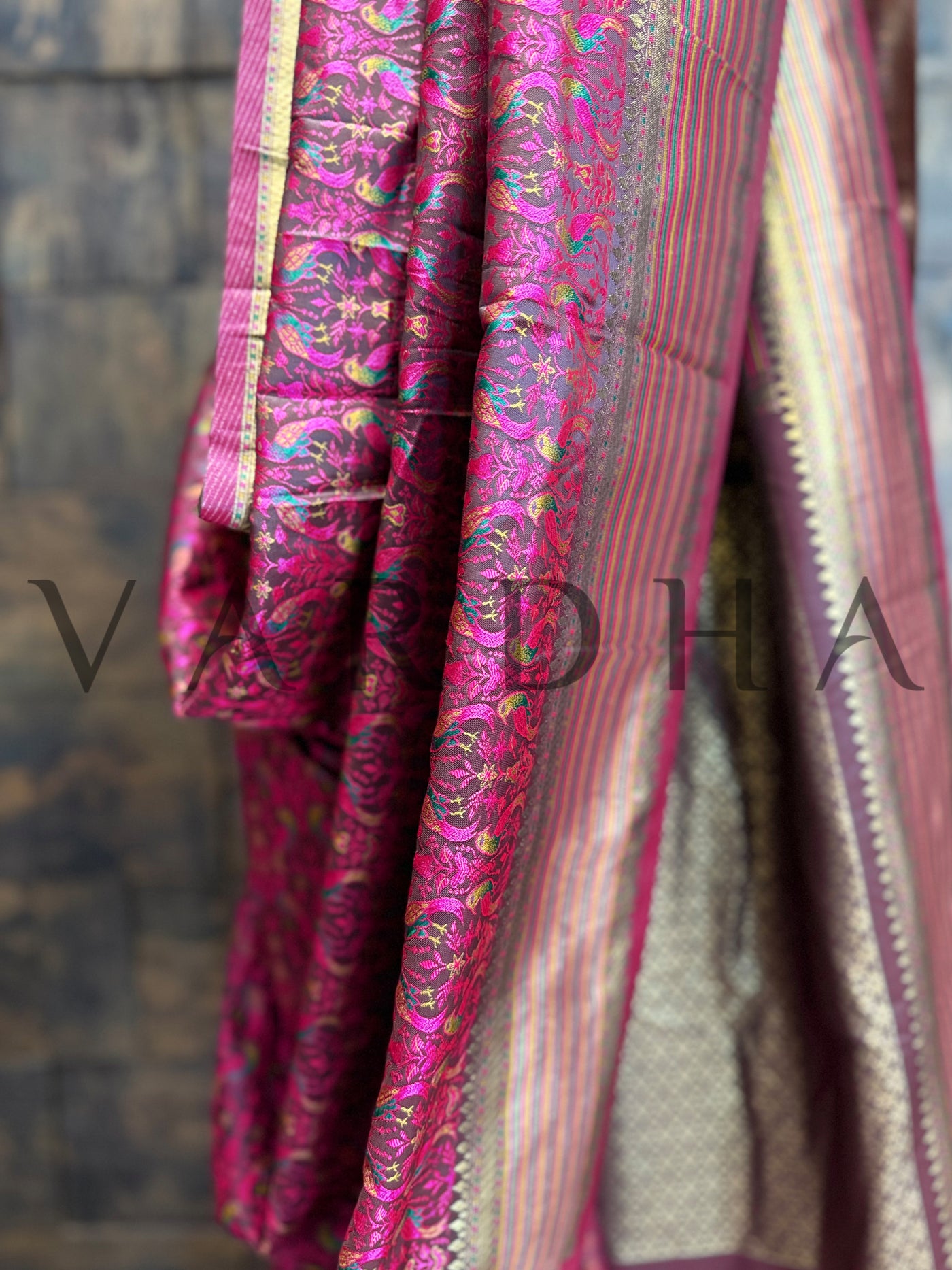 Brocade woven Tanchoi saree in deep wine with gold contrast pallu	Elegant silk saree in wine with intricate thread detailing and smooth drape
