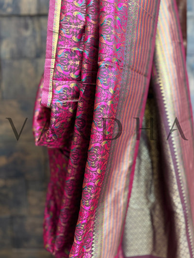 Brocade woven Tanchoi saree in deep wine with gold contrast pallu	Elegant silk saree in wine with intricate thread detailing and smooth drape
