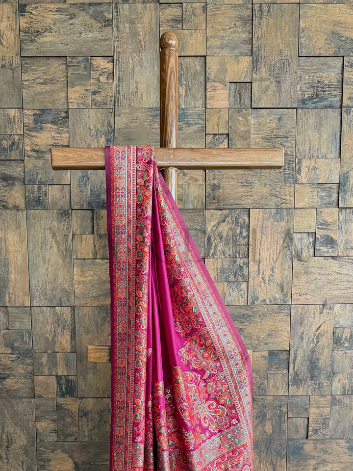 Graceful wine pashmina raw silk saree with detailed embossed thread work, blending tradition with timeless elegance.