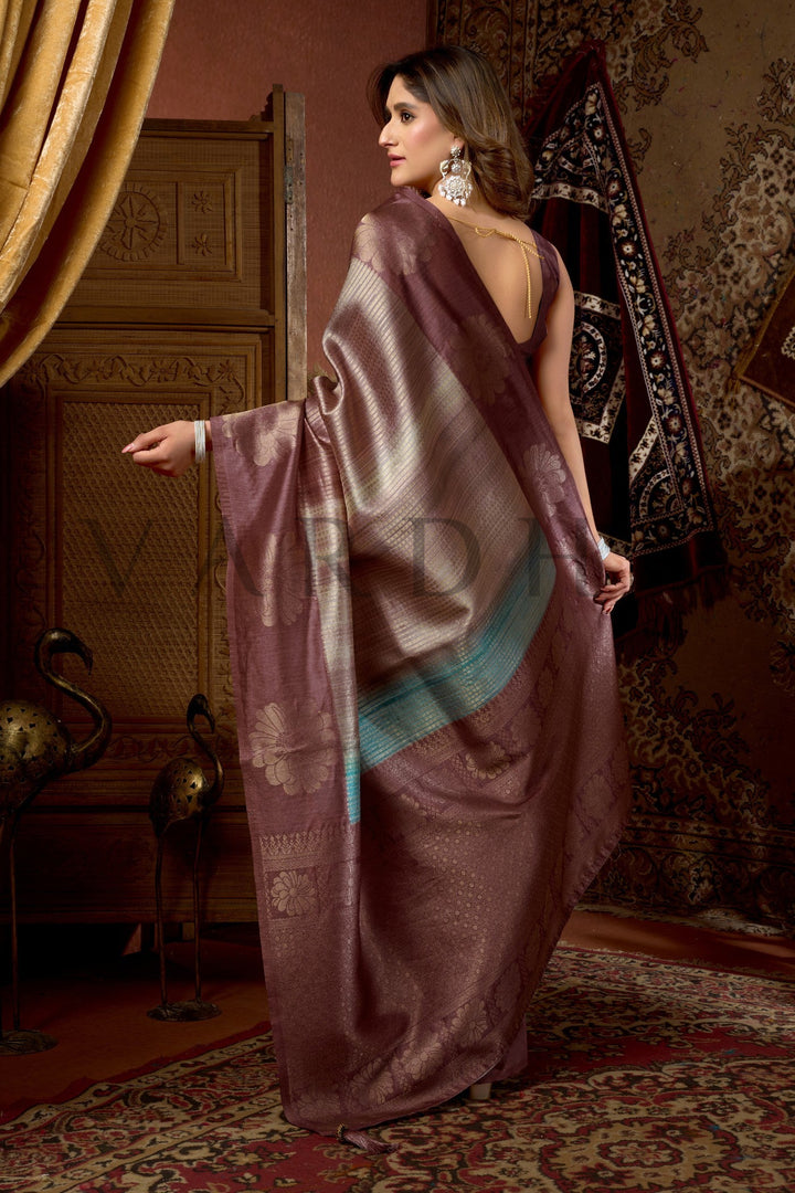 Woman in a traditional saree with a decorative background this luxurious traditional saree promises an effortless drape, making it your ultimate go-to outfit for upcoming celebrations, parties, and grand events.