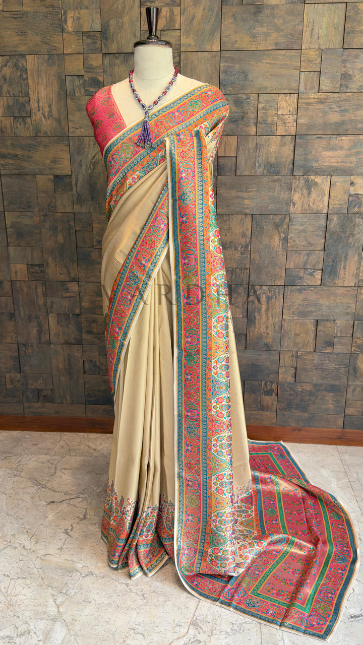 Cream Banarasi Katan Silk Saree with Zari Peacock Motifs and Paisley Pallu