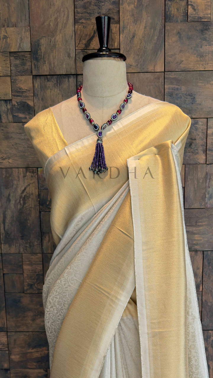 Off White Viscose Kanjivaram Tissue Silk Saree with Gold Zari Border