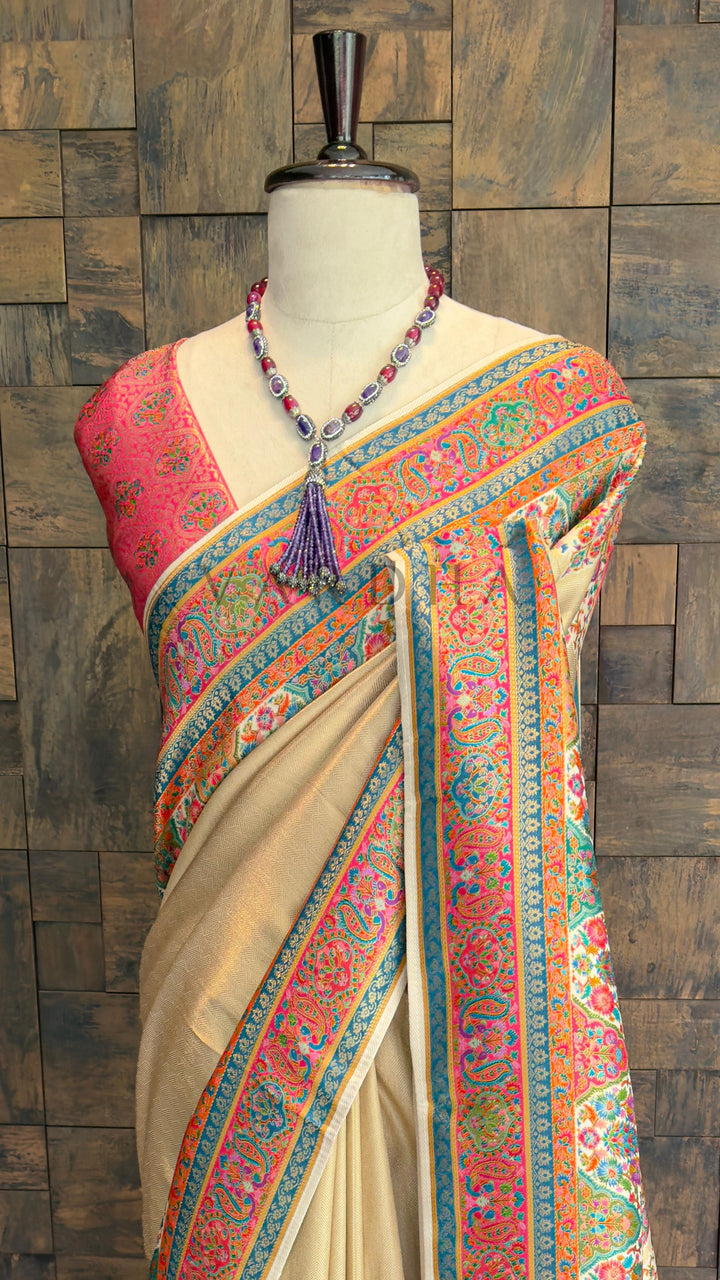 Cream Banarasi Katan Silk Saree with Zari Peacock Motifs and Paisley Pallu