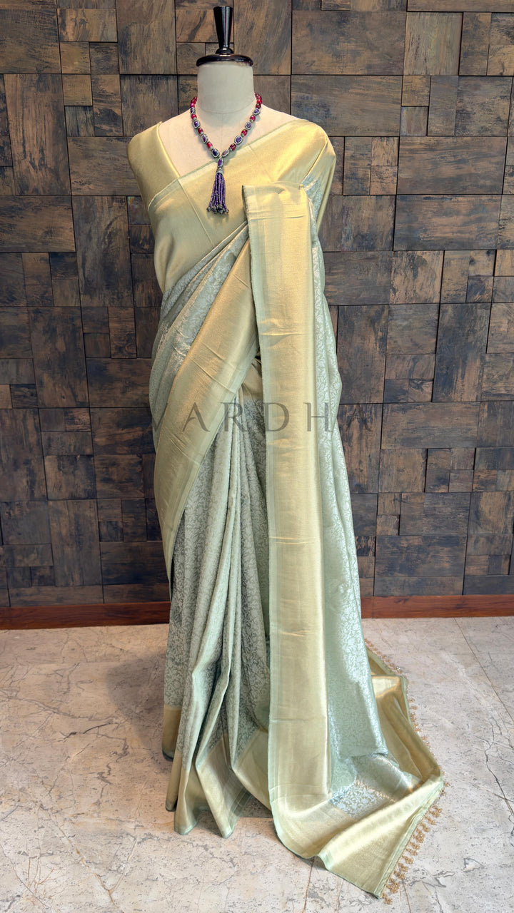 Pista Green Viscose Kanjivaram Tissue Silk Saree with Gold Zari Border