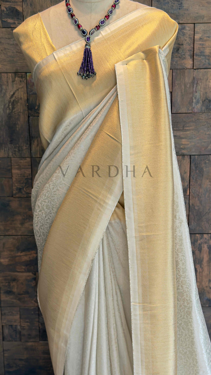 Off White Viscose Kanjivaram Tissue Silk Saree with Gold Zari Border