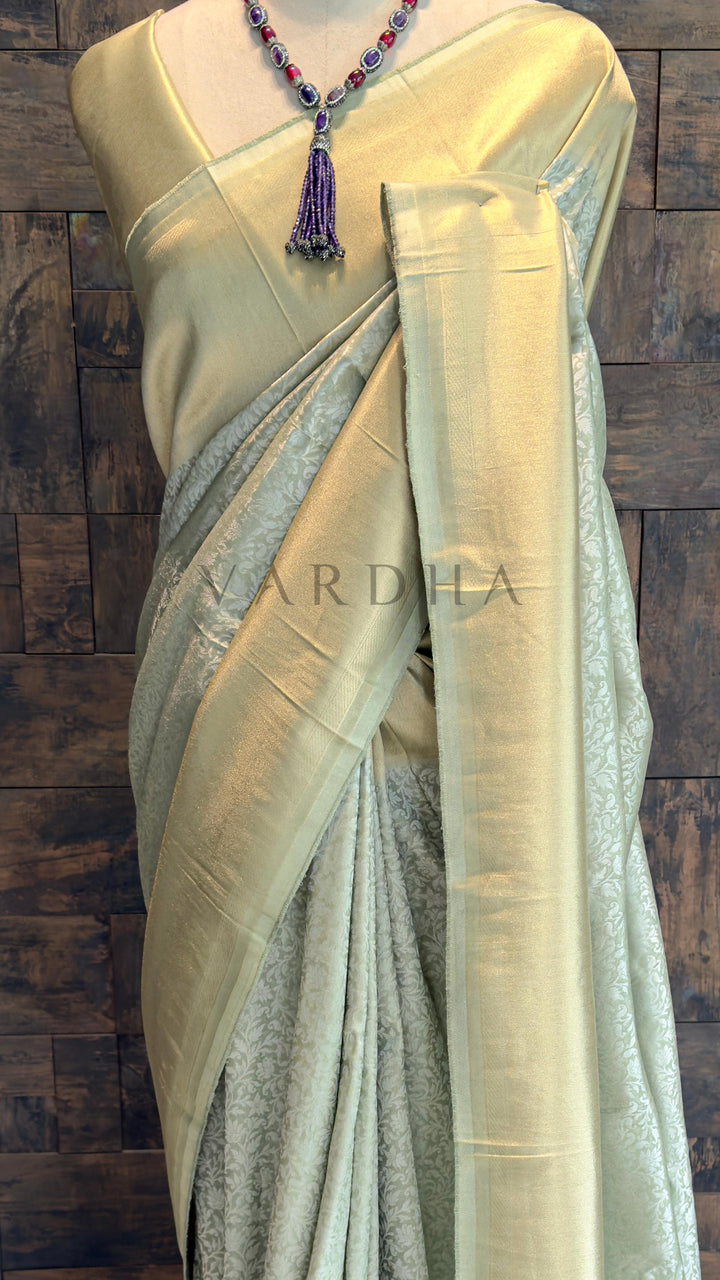 Pista Green Viscose Kanjivaram Tissue Silk Saree with Gold Zari Border