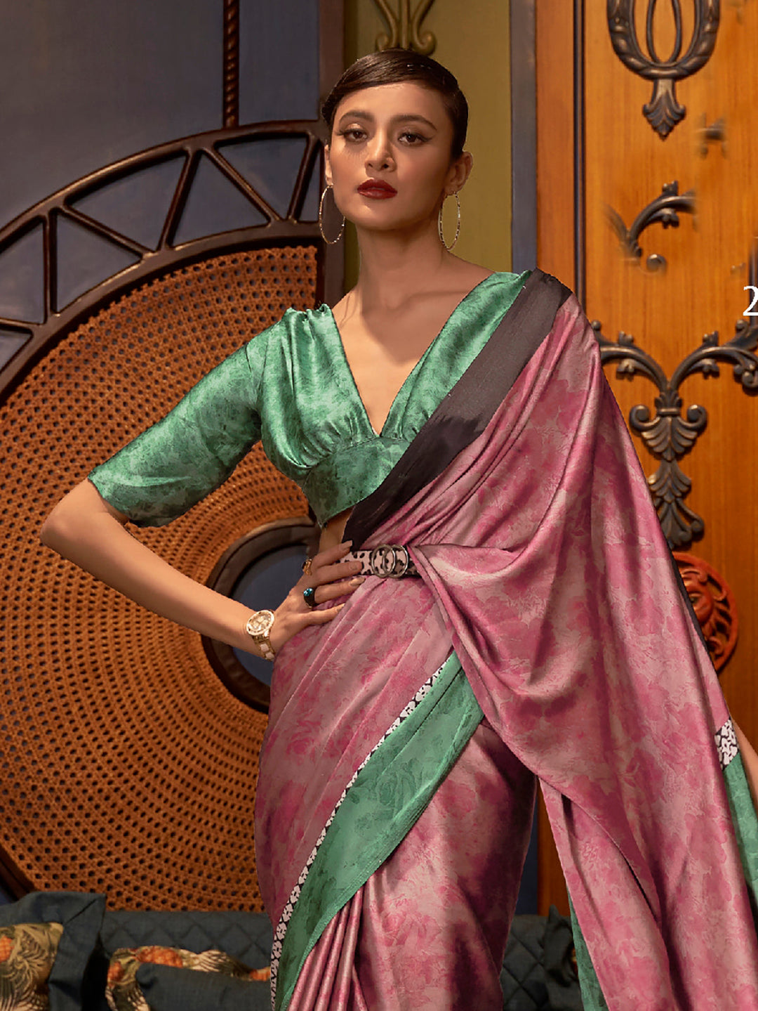Elegant amaranth and viridian Bollywood-style crepe saree adorned with digital prints, suitable for festive celebrations.