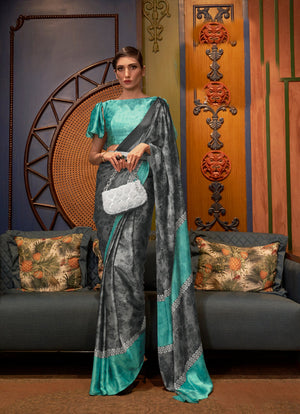 Ash Grey-Robin Egg Blue Bollywood Crepe Saree – Elegant Bollywood-inspired crepe saree in a blend of Ash Grey and Robin Egg Blue, adorned with digital print work. Styled with a complementing Robin Egg Blue blouse for a sophisticated look.