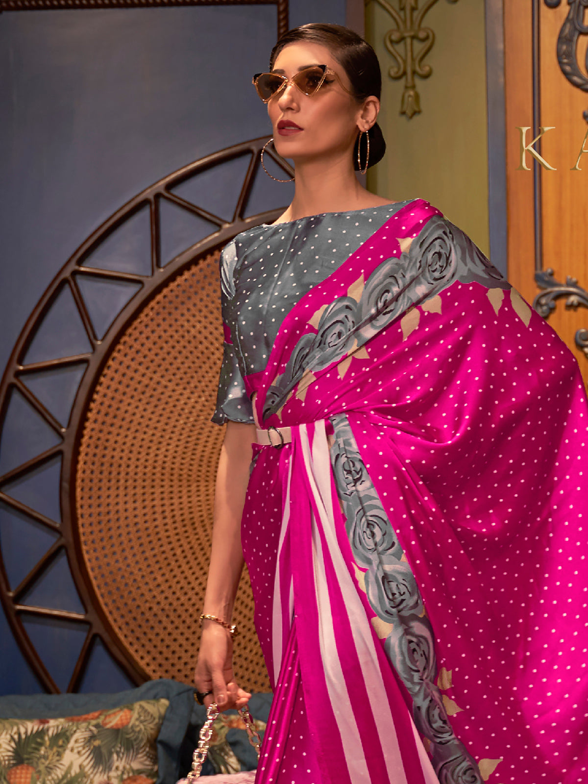 Elegant Barbie pink and ash grey Bollywood-style crepe saree adorned with stylish digital prints, suitable for festive celebrations.