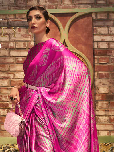 Elegant Barbie pink Bollywood-style crepe saree adorned with stylish digital prints, suitable for festive celebrations.