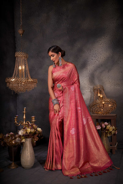 Rear view emphasizing the pallu and detailed weaving in natural lighting.
