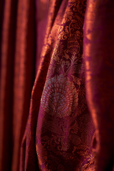 Elegant close-up of zari motifs and pallu design.